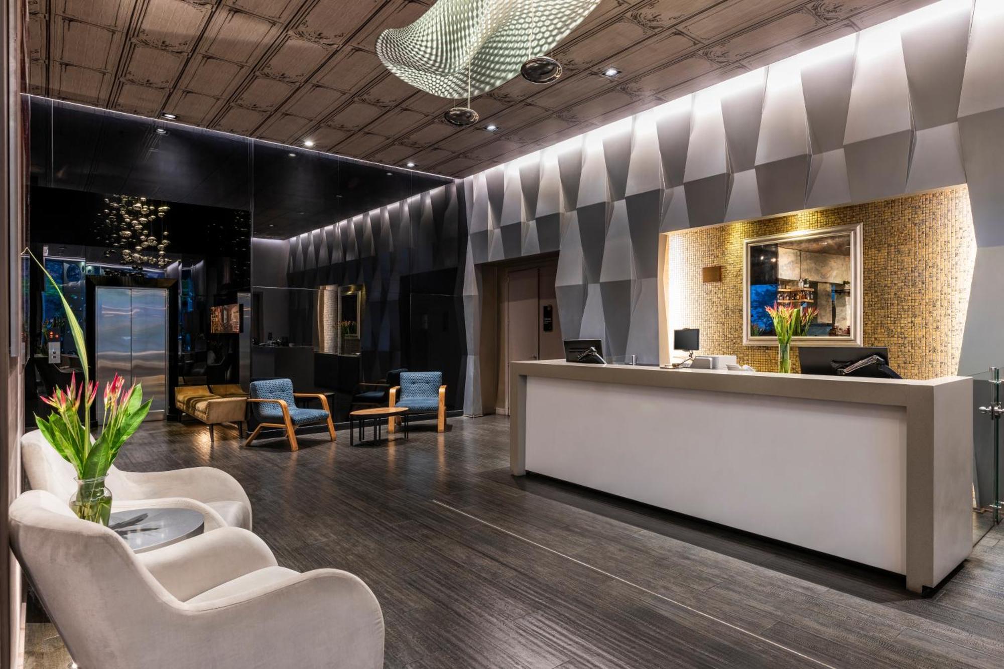 Hotel 100 Luxury Suites By Preferred Μπογκοτά Εξωτερικό φωτογραφία The lobby of the hotel
